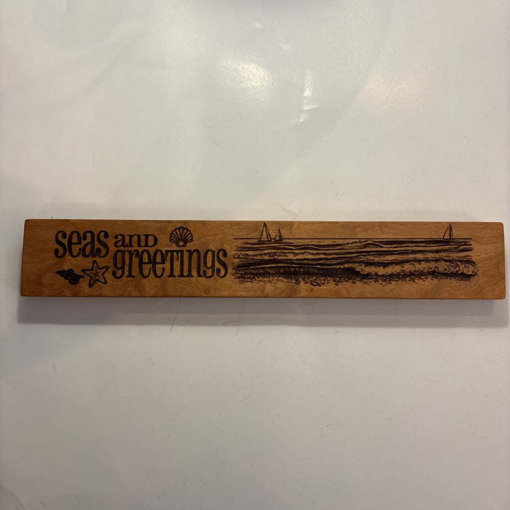 Seas & Greeting Sign